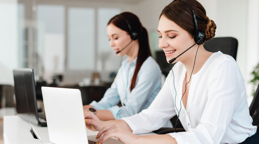 Two customer service officers; Image used for HSBC travel secretary services page.